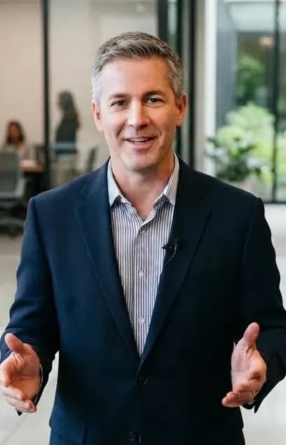 A member of staff speaking in an office